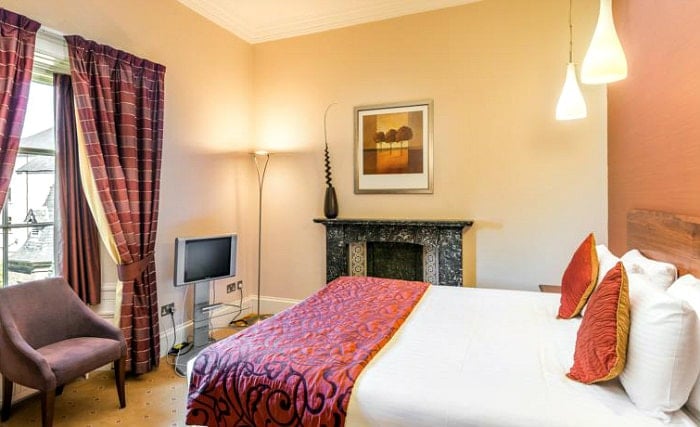 Put your feet up in front of the TV in your room at Salisbury Green