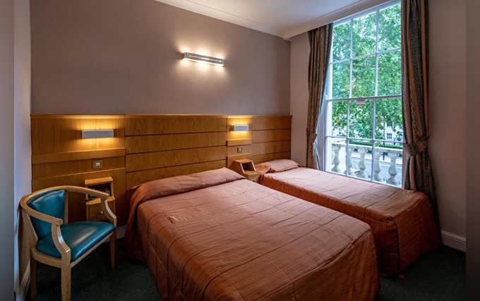 A typical triple room at Nayland Hotel London